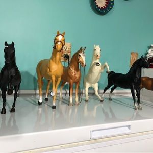 9 Plastic Toy Horses